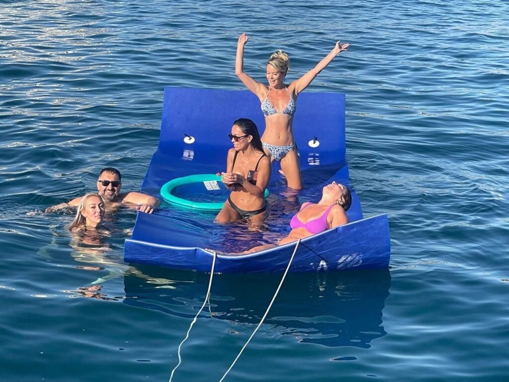 Floating mat fun on a yacht